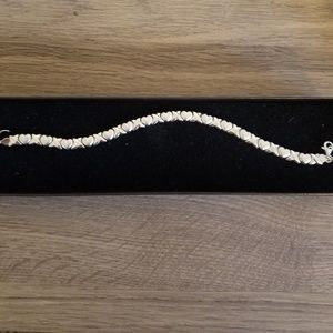 10k White Gold X's and ❤'s bracelet.